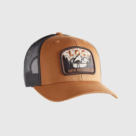A tan and black trucker hat with a rectangular front patch reading 'LOC LIKE NO OTHER' and showing a mountain graphic and the LOC logo, on a light gray background.