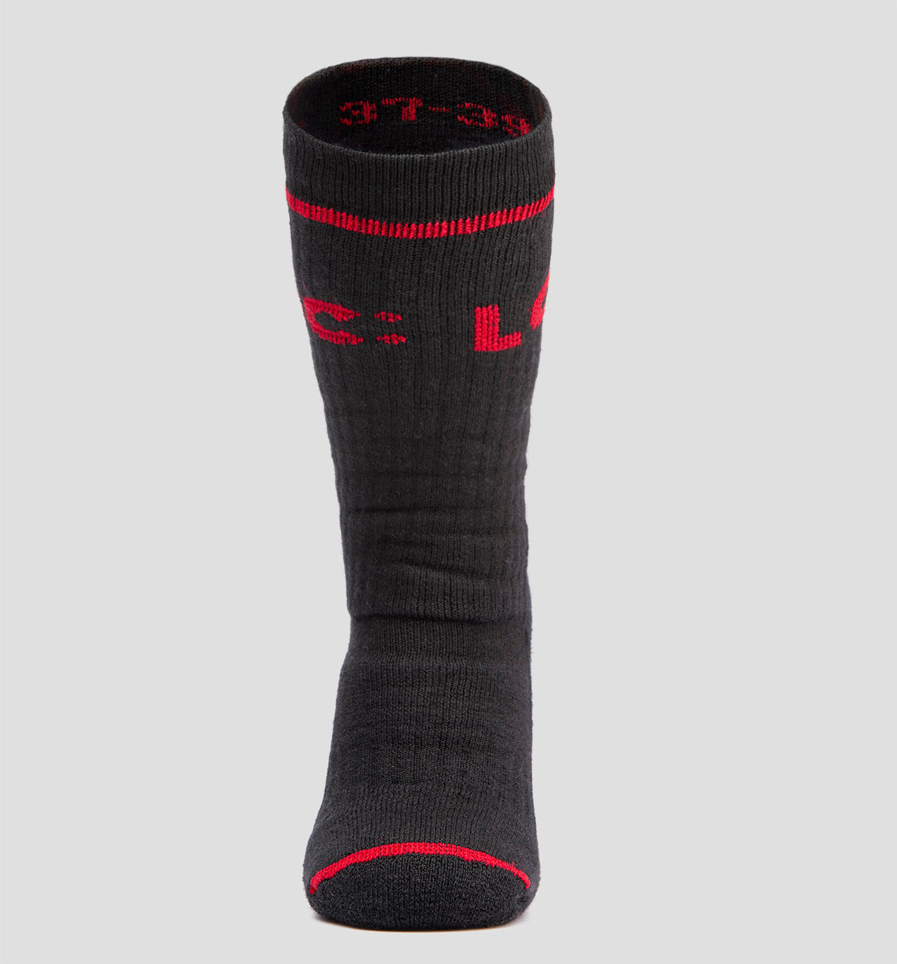 A black LOC merino wool sock with red accents and the brand name 'LOC' in red letters across the cuff.