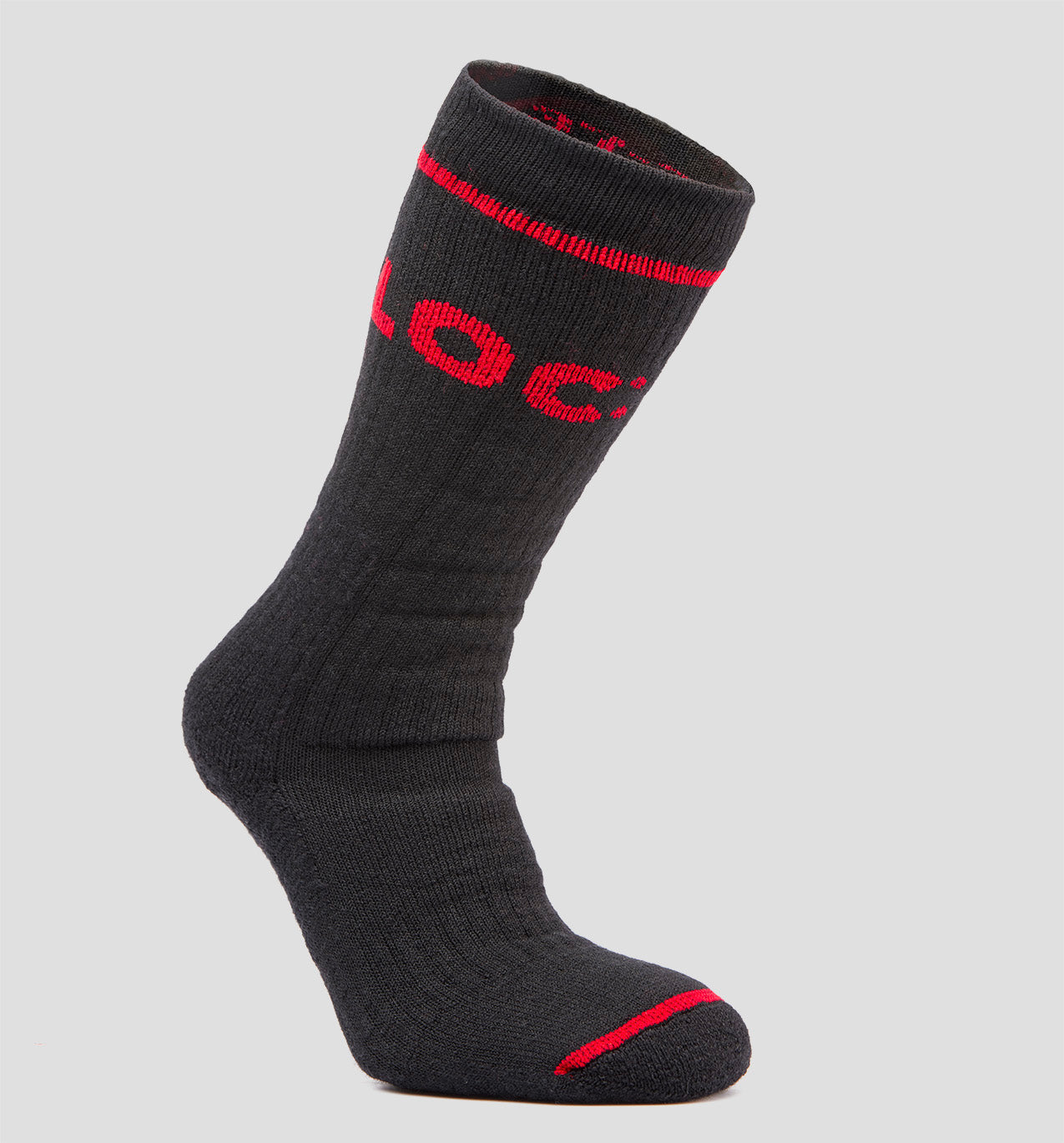 A black LOC merino wool sock with red accents and the brand name 'LOC' in white letters across the cuff.