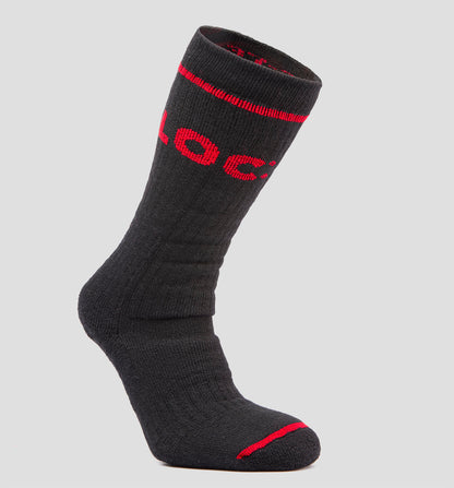 A black LOC merino wool sock with red accents and the brand name 'LOC' in white letters across the cuff.