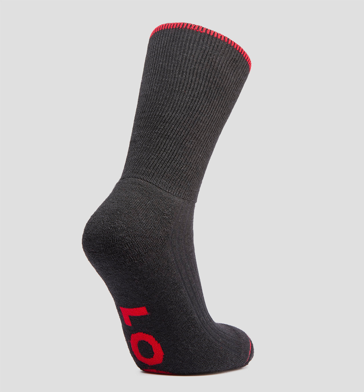 A black merino wool sock with red trim at the top edge, displaying the LOC brand logo under the sole.