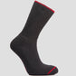 A black merino wool sock with red trim at the top edge, displaying the LOC brand logo under the sole.