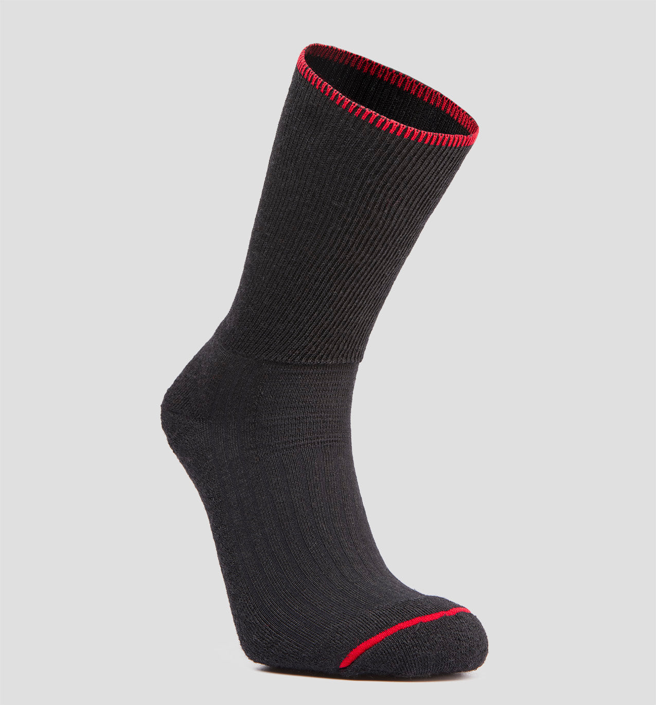 A black LOC merino wool sock with red accents.