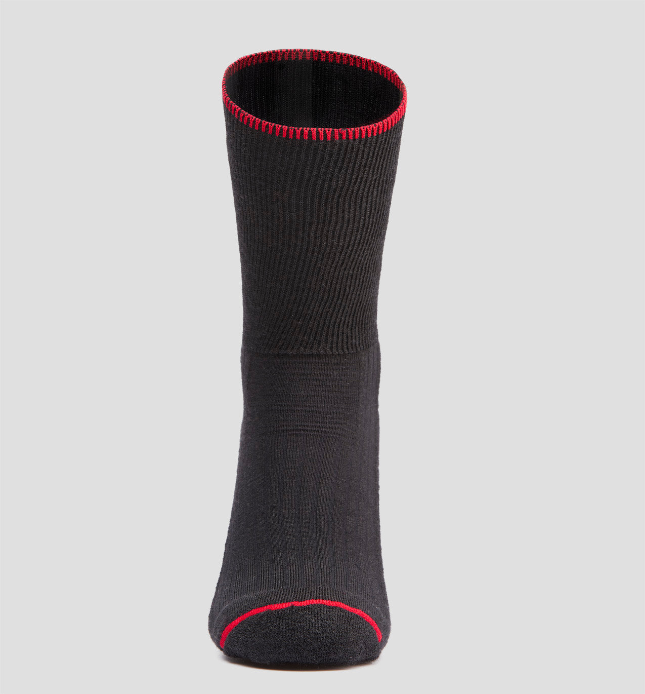 A black LOC merino wool sock with red accents.